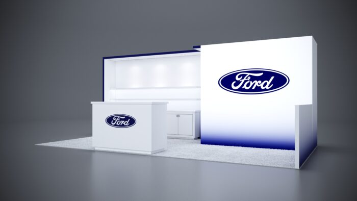 10x20 Trade Show Exhibit with backlit branding and illuminated shelves.