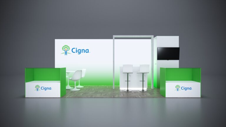 10x20 Trade Show Exhibit with illuminated branding and modern finishes.