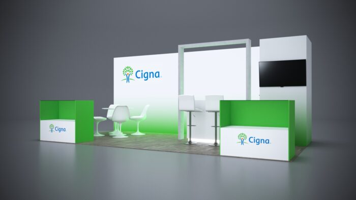 10x20 Trade Show Exhibit featuring stylish counters and branding walls.