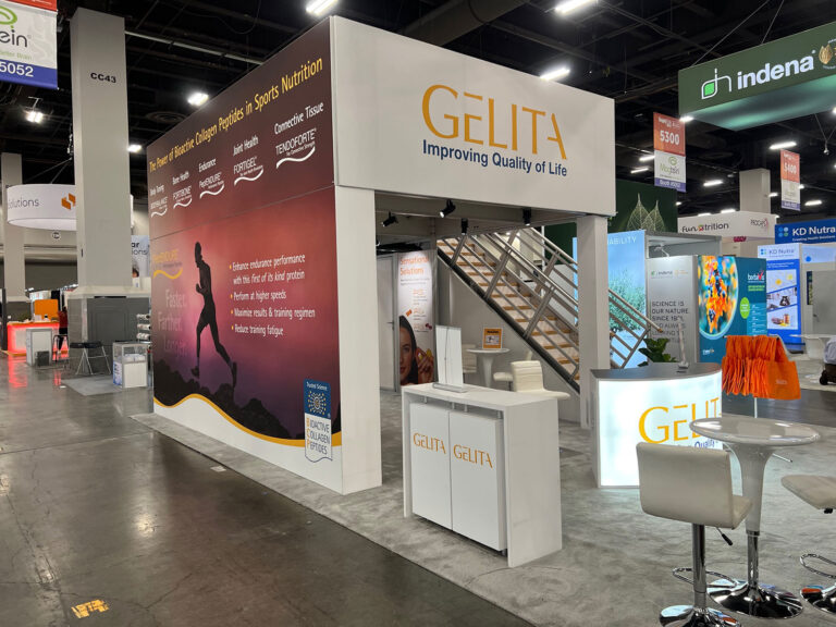20x30 double deck trade show exhibit rental with custom branding and upper-level space.