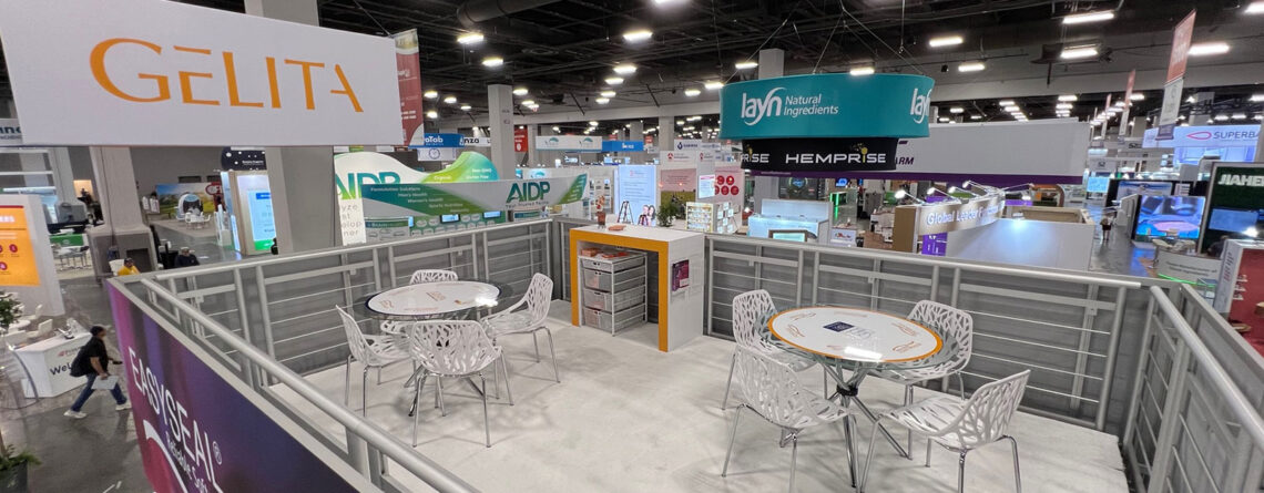 20x30 double deck trade show booth rental with custom branding and graphics.