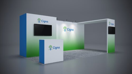 10x20 trade show exhibit with professional counters and backlit branding graphics.