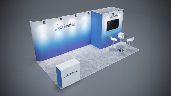 10x20 trade show exhibit with custom counters and branded graphics.